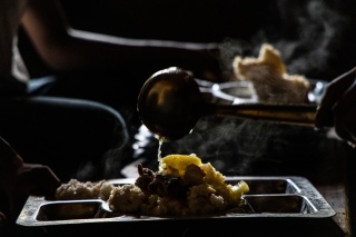 food being poured into a plate