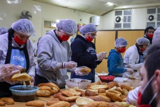 a team of volunteers preparing food