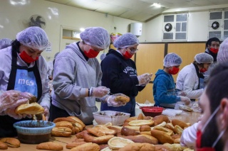 a team of volunteers preparing food