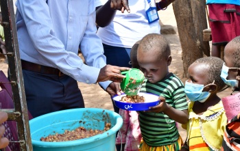 A child being served food in Kenya