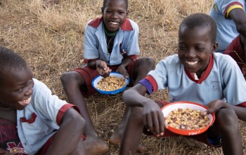 Children in Turkana enjoying Mary's Meals at school.
