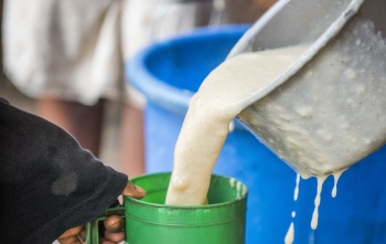 porridge being poured into a mug