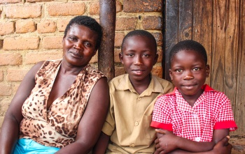 Picture of mother & children looking into camera