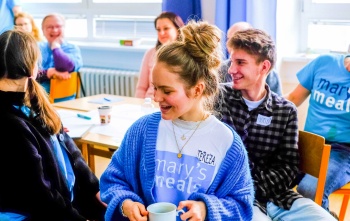 Volunteers share ideas at a meeting