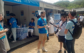 Calum MacFarlane-Barrow being interviewed in Lisbon
