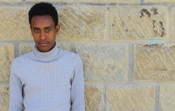 Image of Meargu looking into the camera.