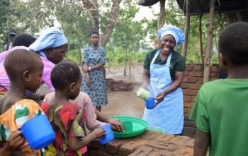 Volunteers serving Mary's Meals