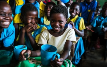 Children eating Mary's Meals in Malawi