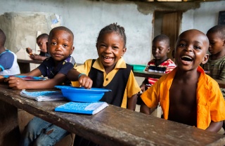 Children enjoying Mary's Meals