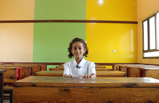 7 year old Doaa from Yemen in her classroom.