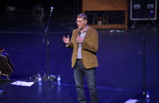 Magnus MacFarlane Barrow giving a speech at Mary's Meals concert event, Canada.