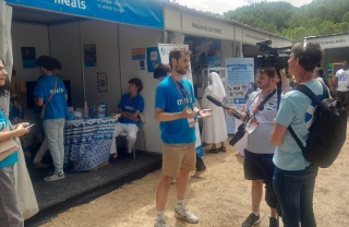 Calum MacFarlane-Barrow being interviewed in Lisbon