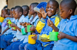 Children eating Mary's Meals