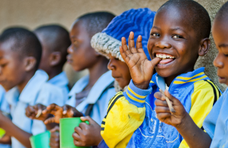 Children in Malawi eating Mary's Meals