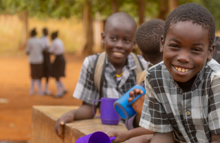 Children waiting for Mary's Meals