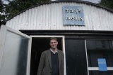 Mary's Meals founder, Magnus MacFarlane-Barrow standing outside The Shed, the global HQ of Mary's Meals. 