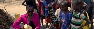 group of people lining up for food