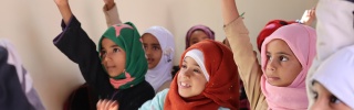 Children from Yemen learning in class. 