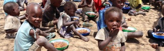 Children eating Mary's Meals at lunch in Turkana.