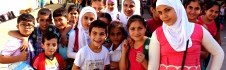 Children gather in a playground