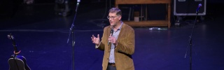 Magnus MacFarlane Barrow giving a speech at Mary's Meals concert event, Canada.