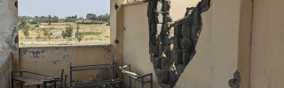 Image taken from inside a building which has suffered damage after the recent conflicts.