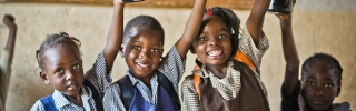 Zambia 10th – children raising mugs