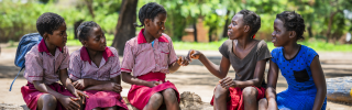 children eating Mary's Meals in Zambia