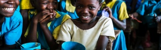 Children eating Mary's Meals in Malawi