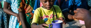 Children eating Mary's Meals in Malawi