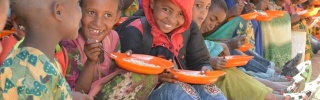 Children eating Mary's Meals