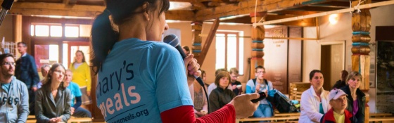 A fundraiser in the Czech Republic talks to a crowd
