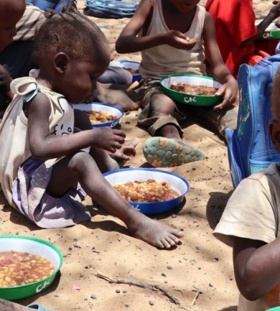 Children eating Mary's Meals at lunch in Turkana.