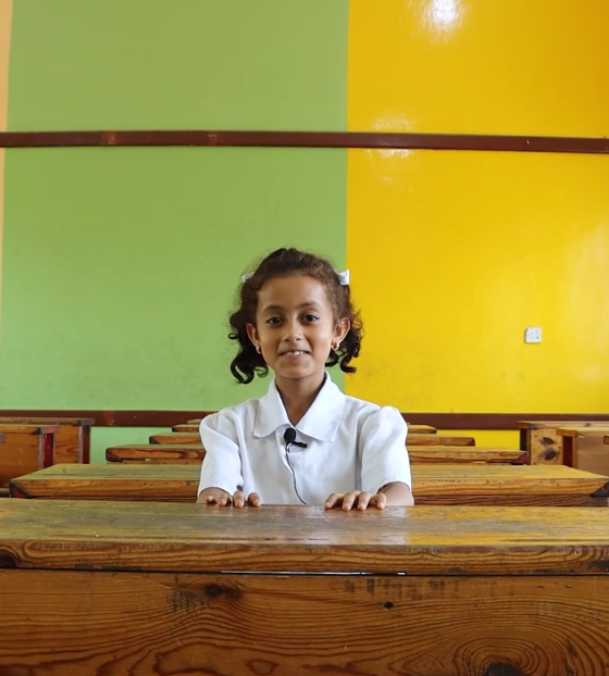 7 year old Doaa from Yemen in her classroom.