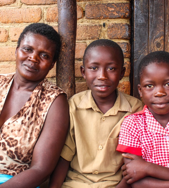 Picture of mother & children looking into camera