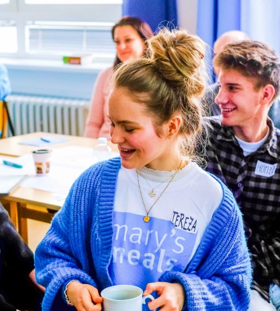 Volunteers share ideas at a meeting