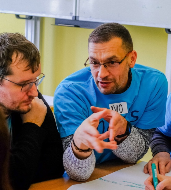 Volunteers in a meeting at a Mary's Meals event