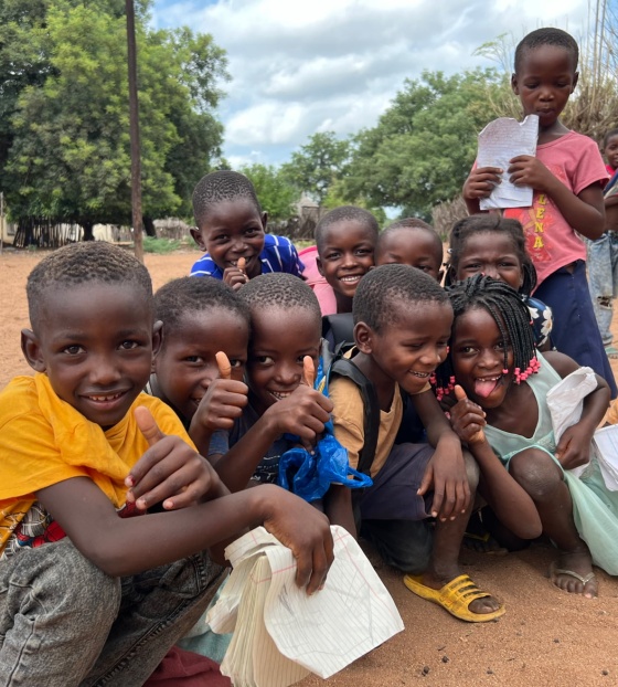 A group of friends together at school in Mozambique.