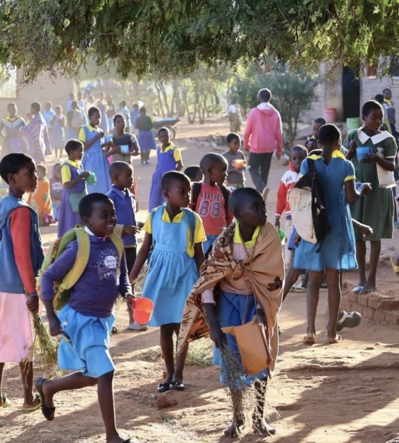 Children in Malawi playing at school.