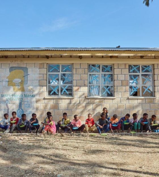 The boys enjoying their meal at Tsehafe Werdi Primary School in Tigray, Ethiopia 