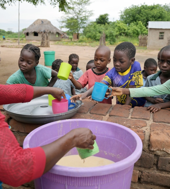2025 - Zambia - children being served meals