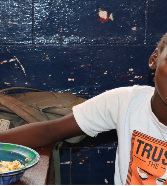 Child eating Mary's Meals in Liberia
