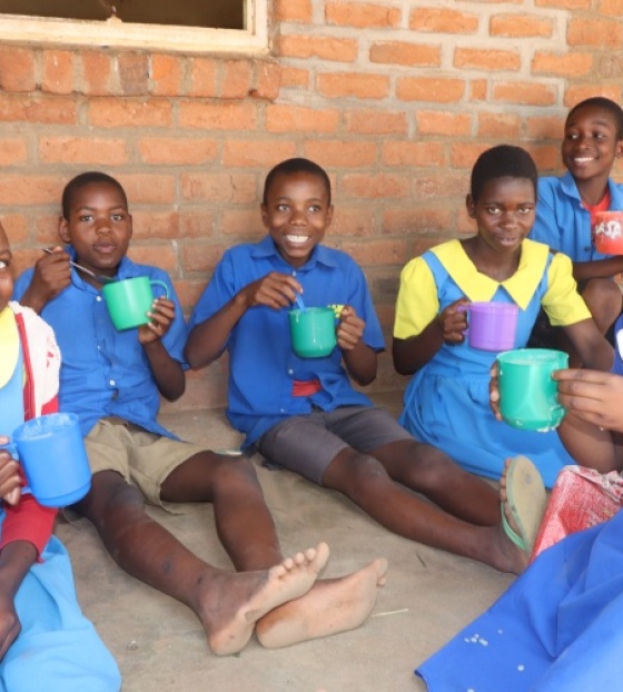 Children eating Mary's Meals in Malawi