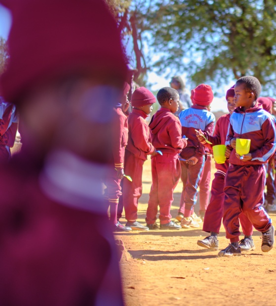 2025 - Zimbabwe - Children receiving porridge