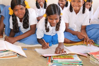 young girls working on their studies