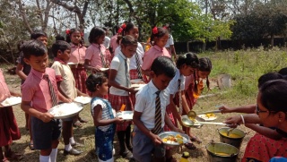 group of children receiving food