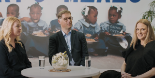 Mary's Meals Founder and Director of Communications speaking with Salesforce. 