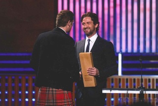 Magnus and Gerard Butler at an awards ceremony