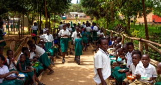 Children gather at a school in Uganda