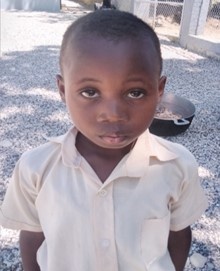 Isaac, a school pupil from Haiti who receives Mary's Meals every school day.